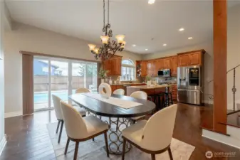 Dining room with slider to pool area.