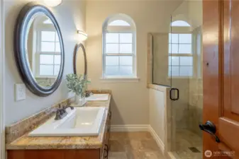 3/4 bathroom with walk-in shower on main floor.