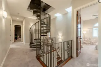 Second floor, Spiral stairs lead to roof top deck.