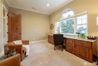 Office with built in desk.