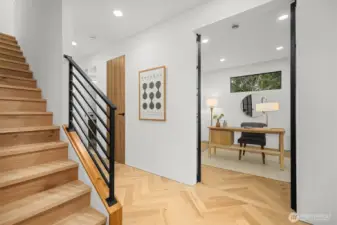 Just inside the front door. Home Office (or 5th bedroom) off entry, includes an ensuite 3/4 bath.  Makes a great guest suite.