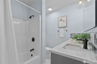 Updated guest bathroom with double vanity.