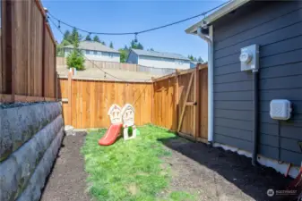 extended side yard, fully fenced