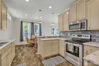 Well appointed kitchen with stainless appliances.