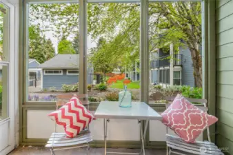 Rarely found enclosed patio offers a private, peaceful retreat—perfect for quiet mornings or relaxed evenings.