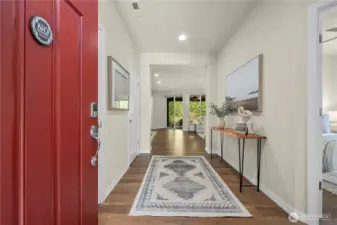 Upon entry you will notice the sweeping hard surface flooring, generous entryway and tons of natural light.
