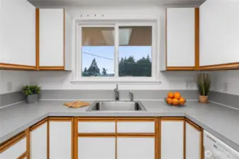 Enjoy a Territorial VIEW from the kitchen sink.