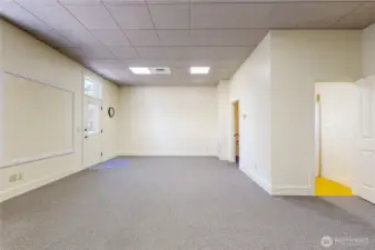 Third side retail space – single-room setup with storage closet and private restroom.