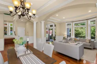 Flawless floor plan with 10' coffered ceilings, grand tiled entry, exquisite columns, crown moldings and wainscoting throughout office, formal living and dining rooms. Beautiful formal dining room showcases stately columns and arched openings.