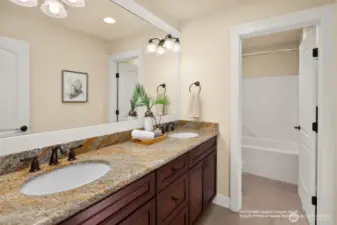Heated tiled floor & skylight in 2nd full bath upstairs.