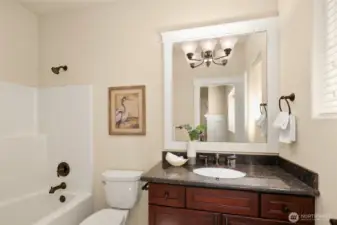 Light filled full bath in daylight basement.