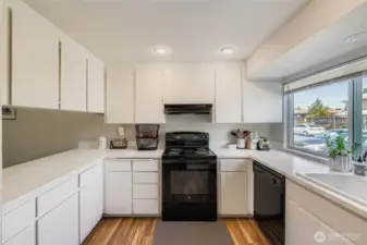 Adequate cabinetry with large east facing window. All appliances included!