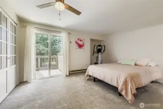 Primary bedroom with private deck/balcony