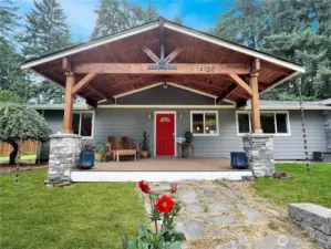 Timber-framed front porch with maintenance-free Trex decking