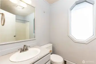 Upstairs main bath with laundry
