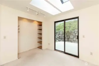 Bedroom 3 with back deck. This bedroom adjoins a massive bonus area.