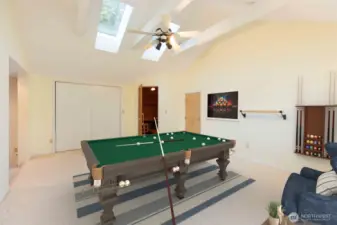 Bonus Room w/ water views, sauna, and access through wooden door is to storage attic space. - Virtually staged