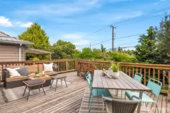 Spacious deck allows room for table and a lounge area.