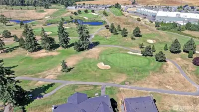 Aerial view of the golf course and the local shopping center.