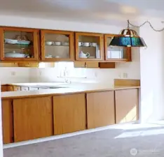 convenient pass through from kitchen under display case