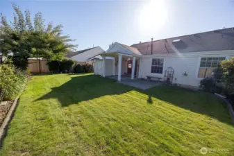 other angle of the fully fenced back yard