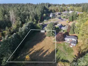 Beautiful cleared and fenced .85 acre lot with power and water already at property.