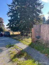 Gate used by subject property and house next door to left