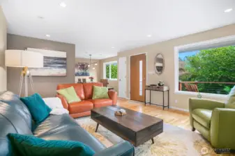 The living room and dining room have large picture windows that let in great natural light.