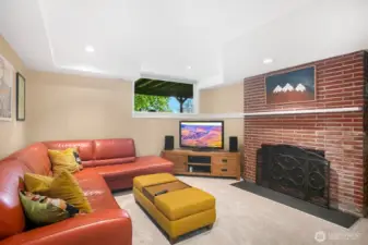 Down on the lower level there is a great family room with a 2nd wood-burning fireplace.