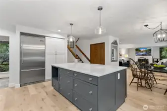 Marble and quartz counters and a Viking fridge.