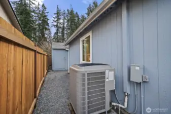 North side of the home, notice the A/C for those warm summer days