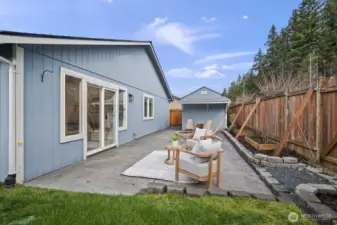 Fully fenced with planters and additional storage—perfect for tools and toys