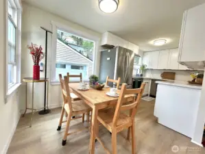dining room and kitchen and view to garage