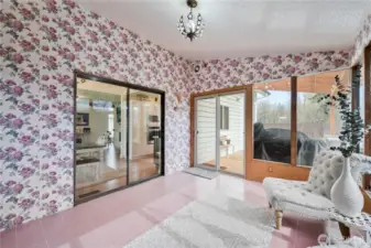 Sunporch leads to back deck