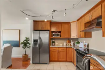 A spacious chef's kitchen with stainless steel appliances