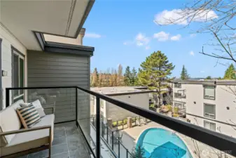 Enjoy morning coffee with pool and lake views