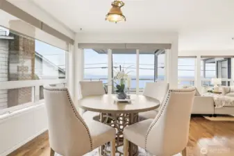 Dining space opens up to the covered deck.