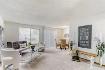 Spacious living room with fresh interior paint & New carpet!