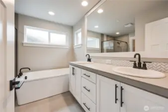 Photos of a 1907 built at another community.  for reference only. Countertops at Coyote Ridge will be quartz slab