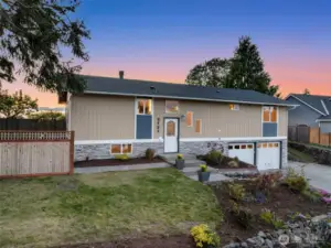 Exterior front, apartment private access is on the left side of the home