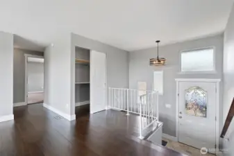 Entry way, hallway closet, secondary Laundry