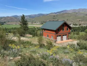 Breathtaking vistas from every angle of the home and lot. Beautiful natural landscaping with wild meadows and open views, covered in wildflowers