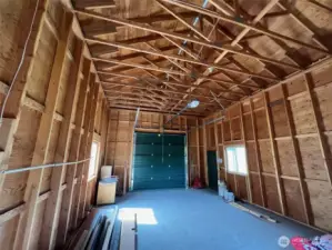 Interior of shop is unfinished and ready for your vision; stubbed for water and septic.
