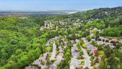 Drone shot with house location in relation to City of Seattle