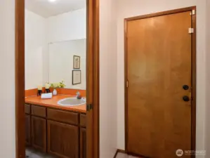 1/2 Bath off between Family Room & Garage