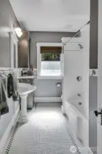 large main bath with traditional mosaic tile