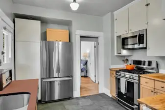 Stainless appliance and a gas range.