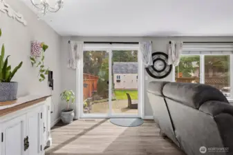 Dining area looking out to fully fenced backyard