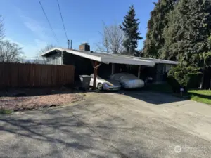 East side of the property that can park at least 8 vehicles