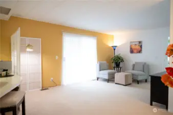 Bonus room with sliding door to deck from dining room.